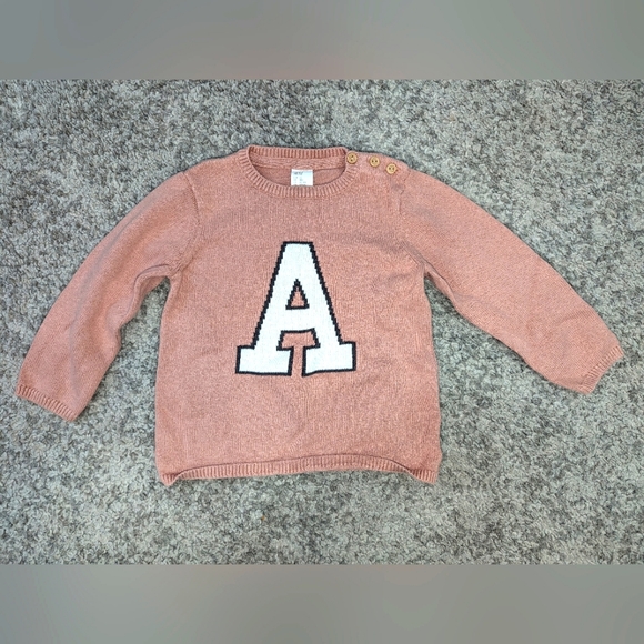 2/$18. H&M pink shirt. Letter "A" size 12-18 months. - Picture 1 of 3